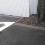 stamped brown concrete curbing